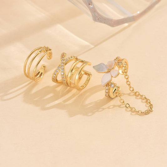 Fjärilsöronklämmor med zirkon