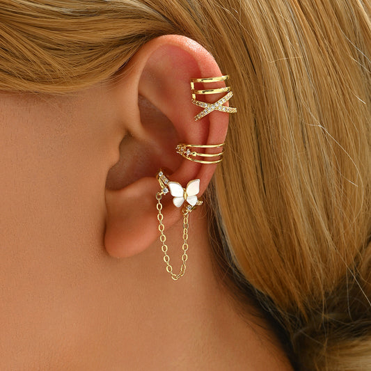 Fjärilsöronklämmor med zirkon
